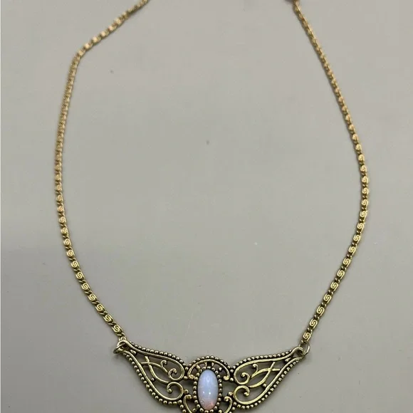 Gold Winged Necklace with White Gemstone - Picture 2 of 3